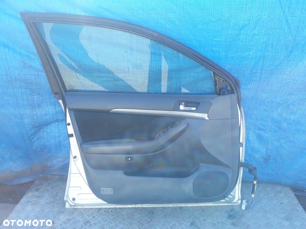 DRZWI LEWY PRZÓD TOYOTA AVENSIS II T25 LIFT 2007r  KOLOR: 1C0 - 7