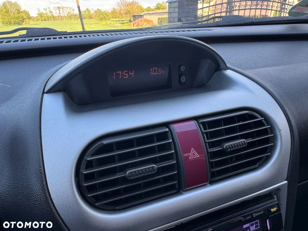 Opel Corsa 1.2 16V Enjoy Easytronic - 22