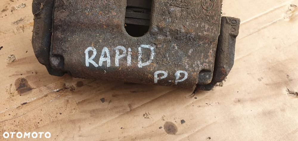 Zacisk hamulcowy prawy przód przedni prawy Skoda Rapid - 7