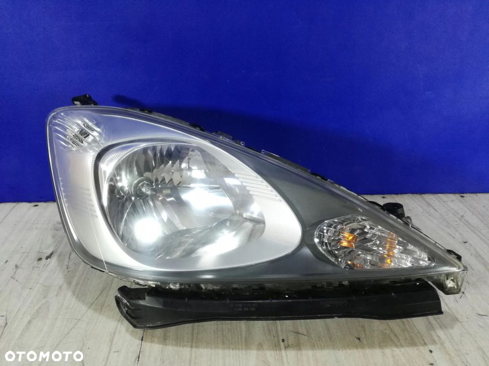 Honda Jazz 3 III lampa reflektor przód prawa Anglik 08/11 - 2