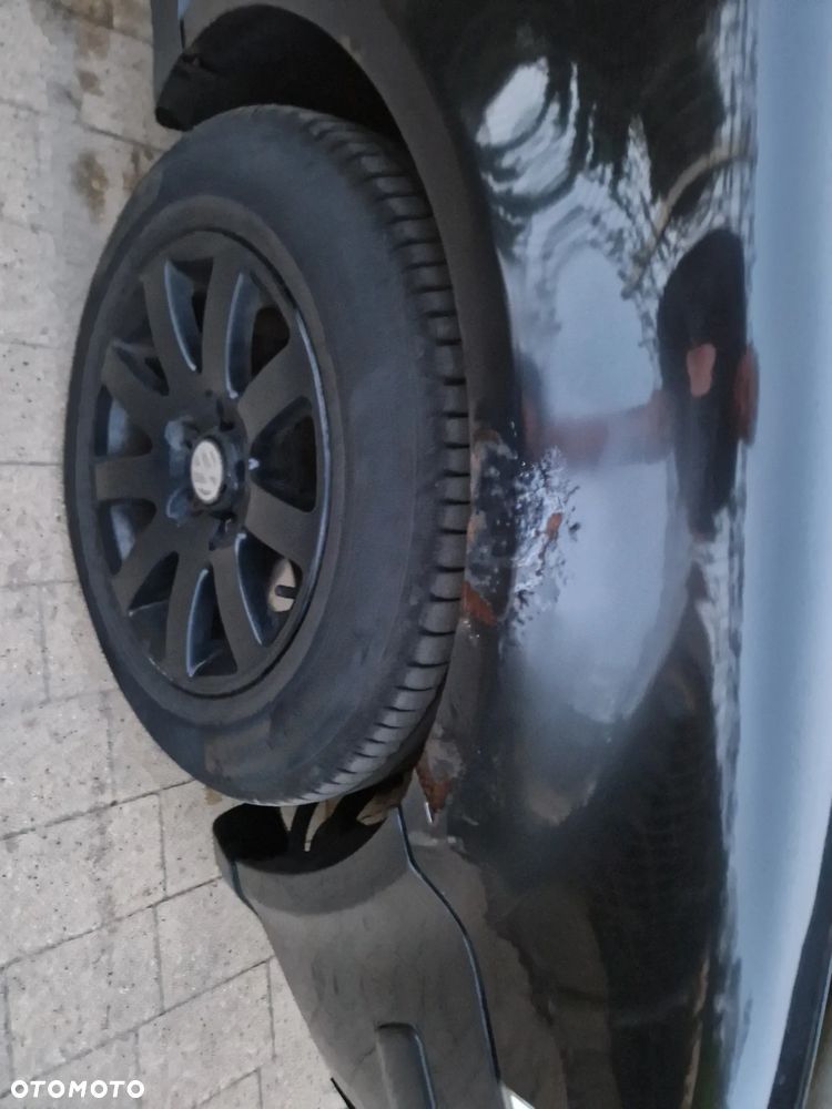 Volkswagen Passat 1.9 TDI Highline - 11