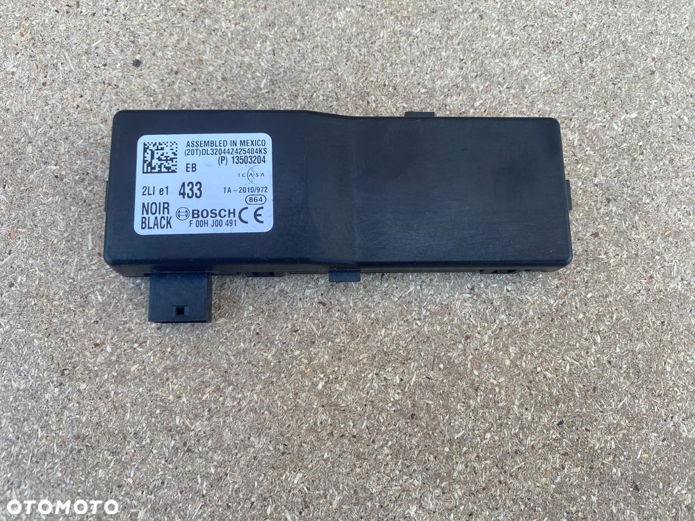 MODUŁ STEROWNIK CENTRALNEGO ZAMKA OPEL CORSA E 13503204 - 1