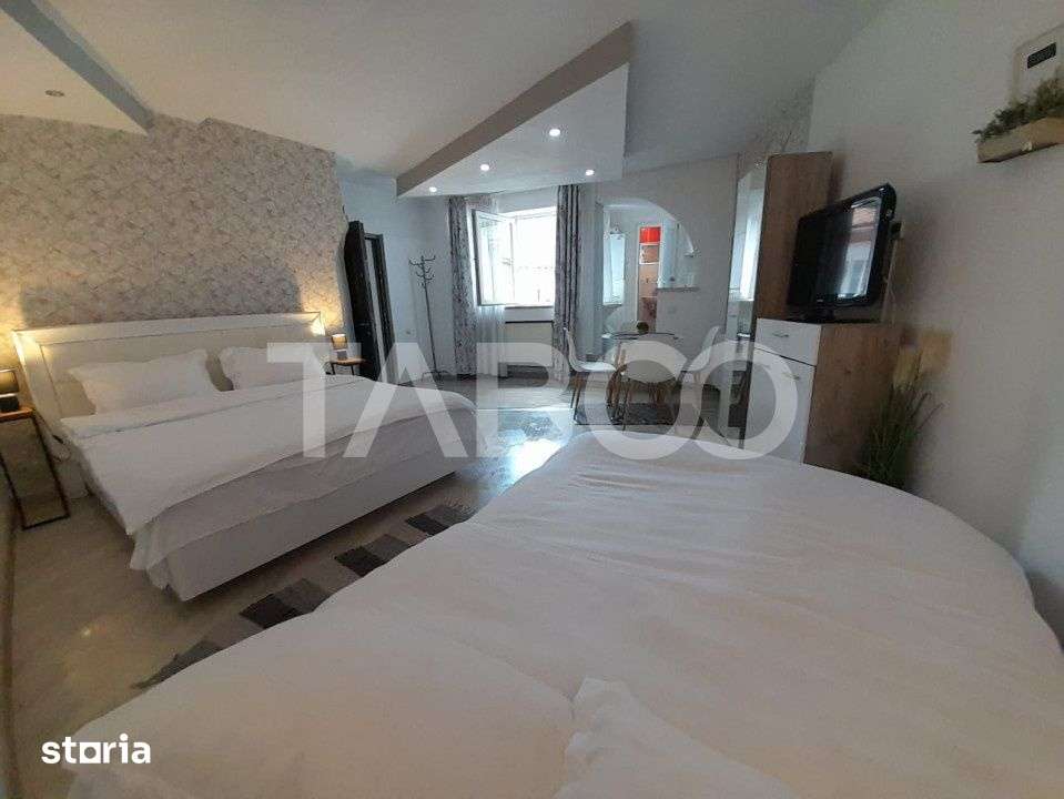 Garsoniera cocheta 30 mp la parter de vanzare Ultracentral Sibiu — fotografia 1