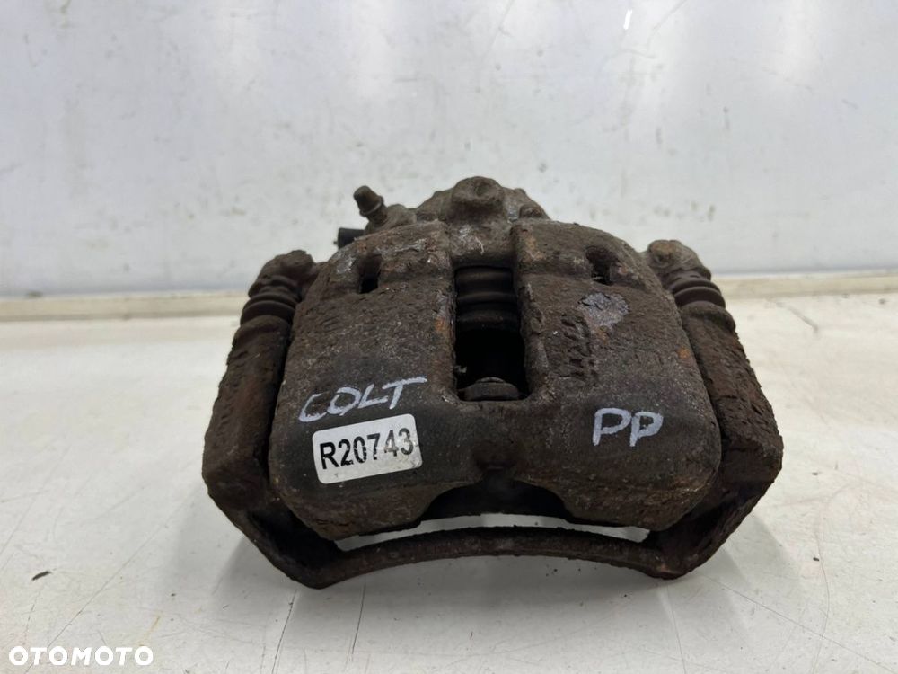 Zacisk hamulcowy Mitsubishi Colt VI 6 Z30 Smart Forfour I w454 04-12r. prawe przednie mocowanie - 2