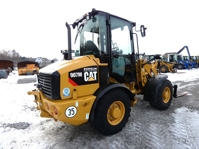 Caterpillar CAT 907M Z Niemiec / Wyjątkowo Wyposażony / 35km/h / 3.050mtg / - 11