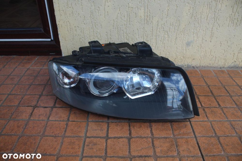 LAMPA PRAWY PRZÓD XENON EUROPA AUDI A4 B6 8E0941004P - 1