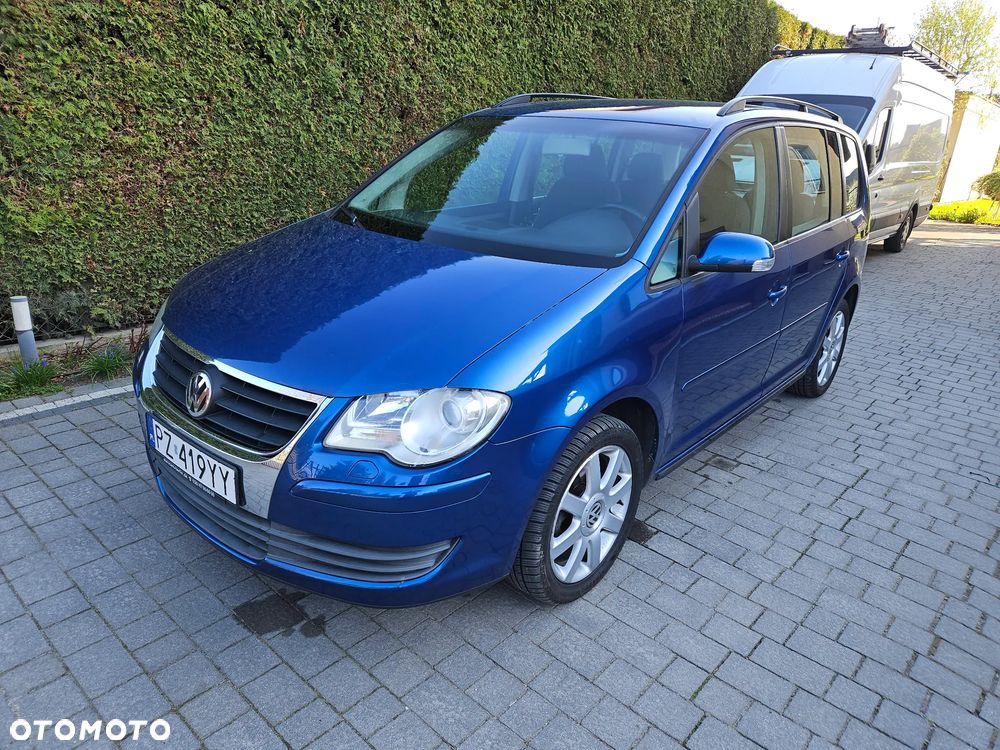 Volkswagen Touran 1.4 TSI DSG Conceptline - 1