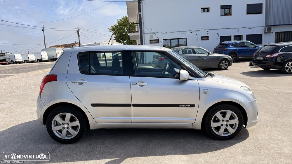 Suzuki Swift 1.3 DDiS GLX - 1