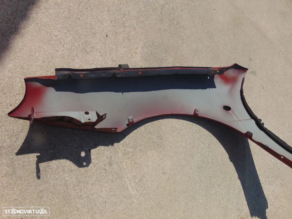 Mazda MX3 guarda lamas - 11