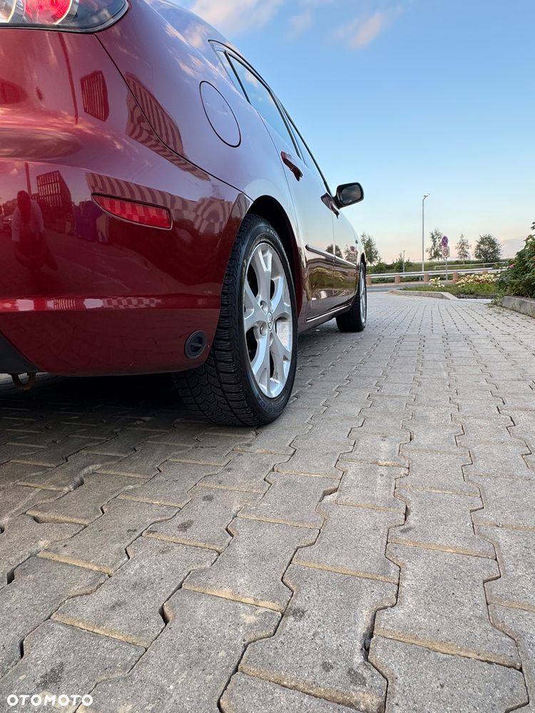 Mazda 3 2.0 Exclusive + - 13