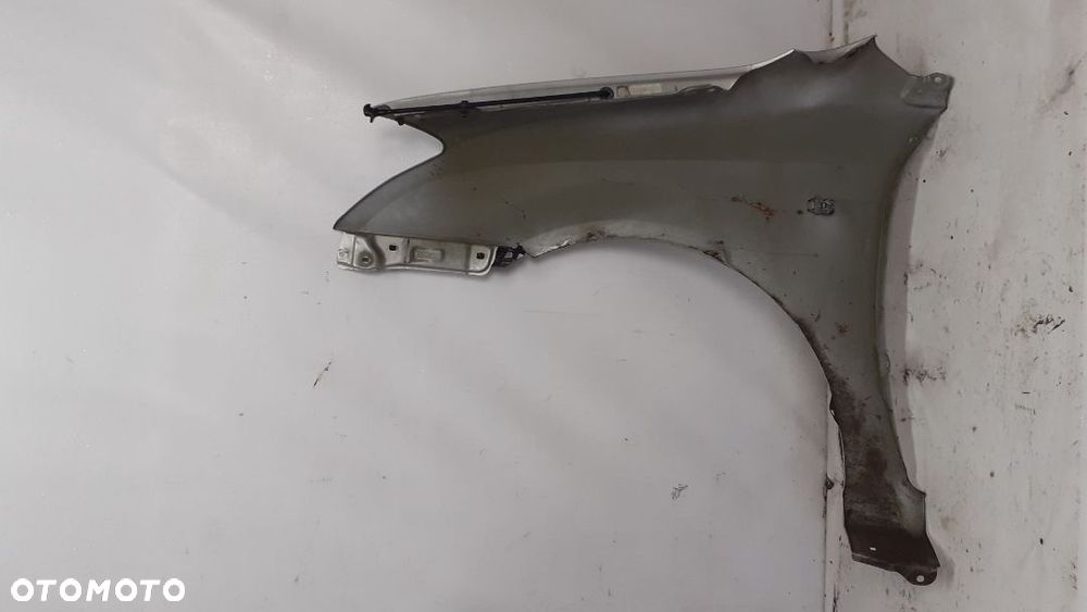 * TOYOTA COROLLA E12 BŁOTNIK PRZEDNI PRAWA 199 SREBRNY - 4