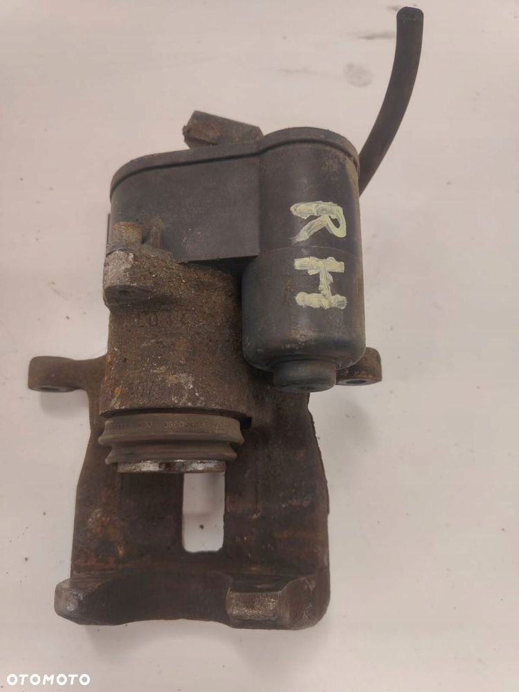 volkswagen passat b6 05-10 zacisk hamulcowy prawy tyŁ tylny - 2