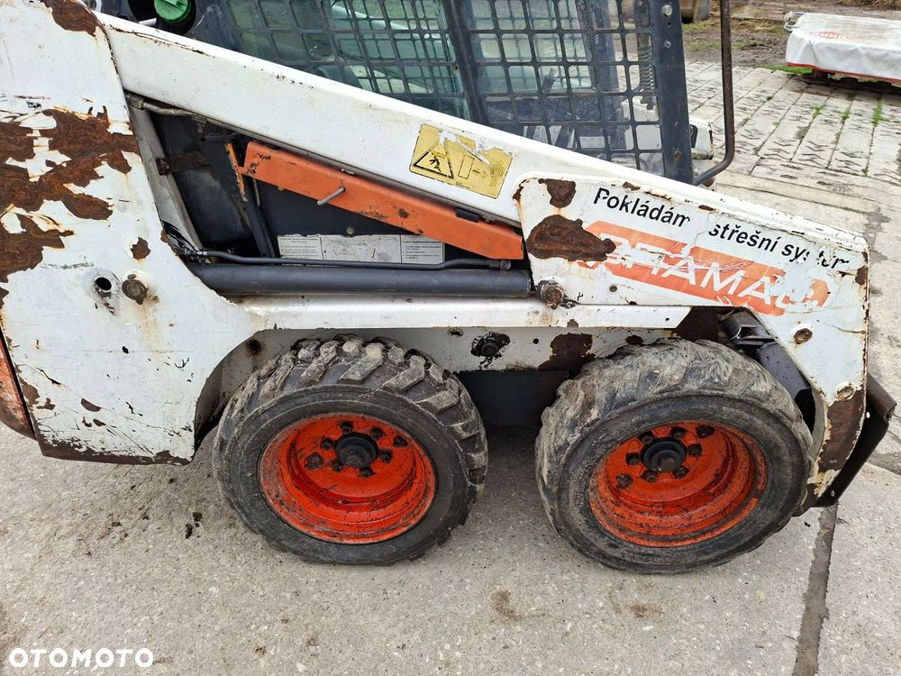 Bobcat 553 4X4 + Melroe Ingersoll-Rand 725S B/H - 25
