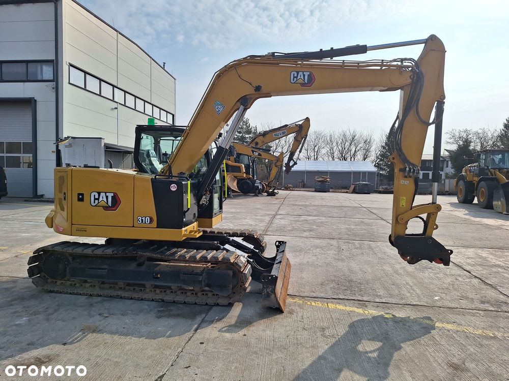 Caterpillar 310 - 3