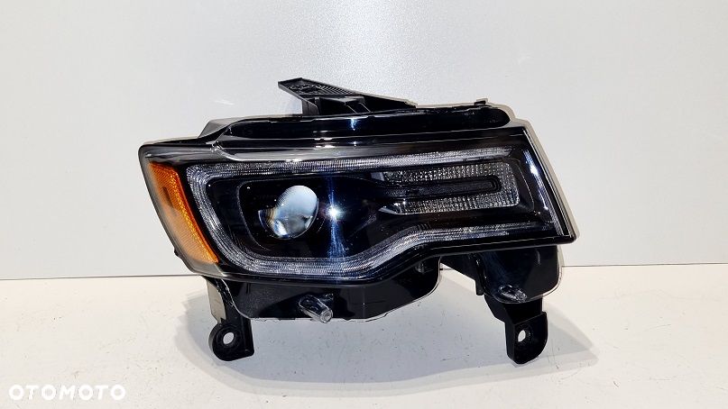 REFLEKTOR PRAWY XENON JEEP GRAND CHEROKEE WK2 USA NIESKRĘTNY - 1