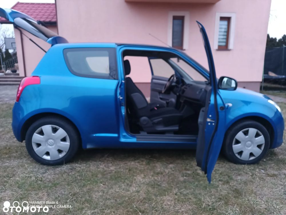 Suzuki Swift 1.3 GLX / Comfort - 33