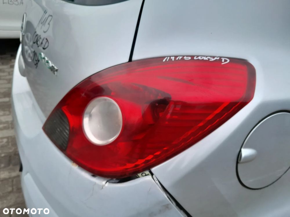 OPEL CORSA D LAMPA TYLNA PRAWA W BŁOTNIK 3D - 2