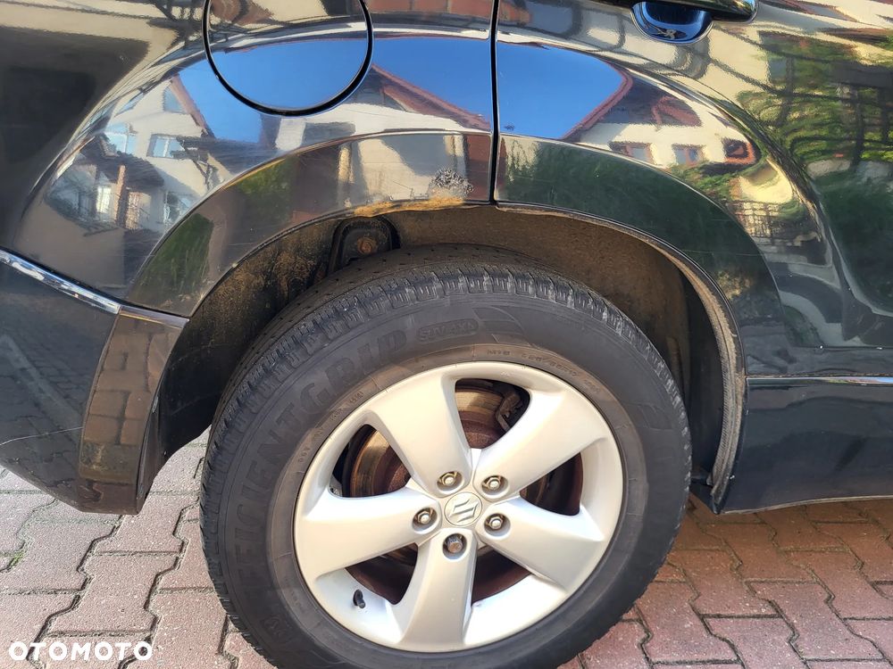 Suzuki Grand Vitara 2.4 Premium - 13