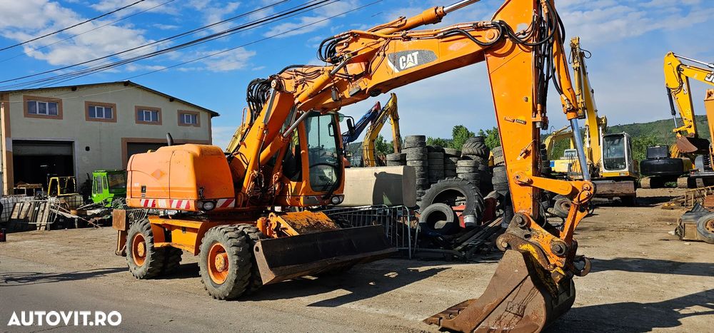 Caterpillar CAT M313 D Excavator pe roți - 9