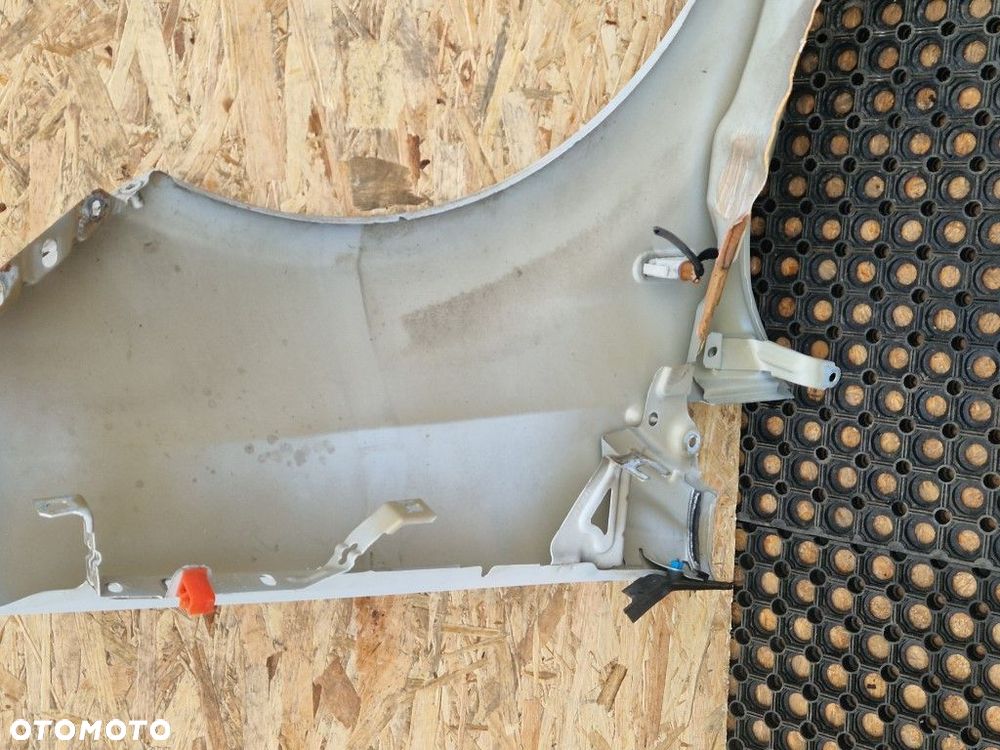 FIAT PUNTO EVO kod lak.760 a BŁOTNIK PRZÓD PRZEDNI LEWY - 11