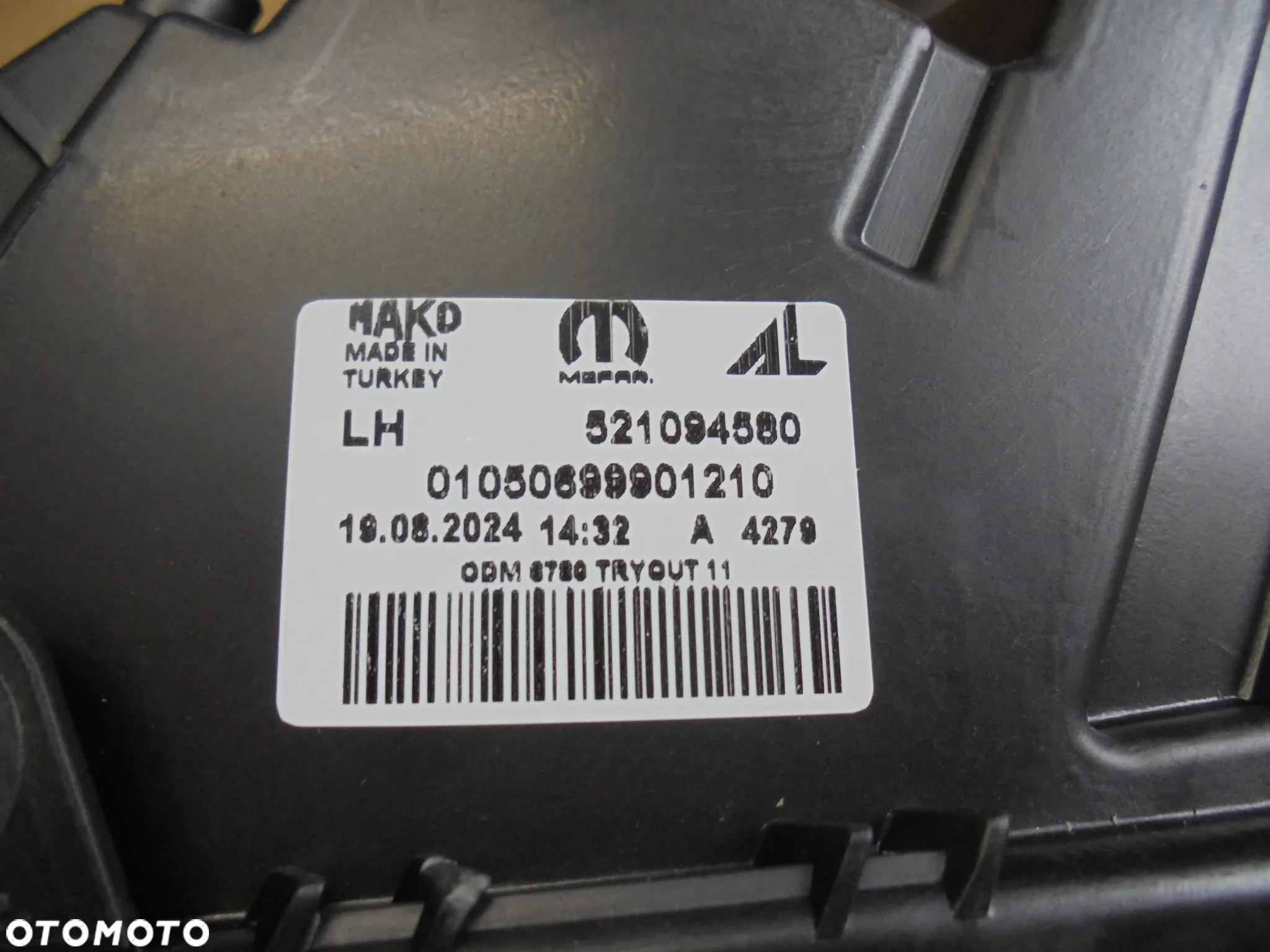 REFLEKTOR LAMPA LEWA FIAT DOBLO 2015-> NR OE 521094580 CZARNA - 2