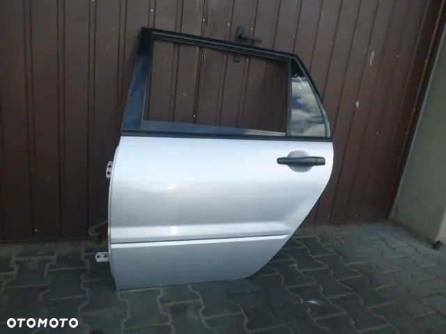DRZWI LEWY TYŁ LEWE TYLNE KOMPLETNE MITSUBISHI LANCER 03-08 - 11