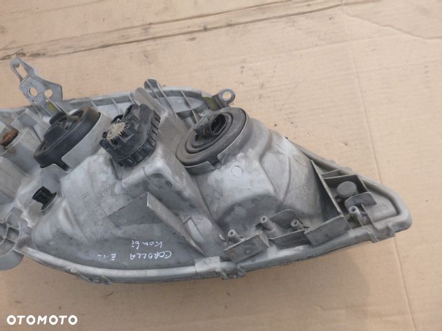 LAMPA LEWY PRZÓD LEWA PRZEDNIA TOYOTA COROLLA E12 01- - 18