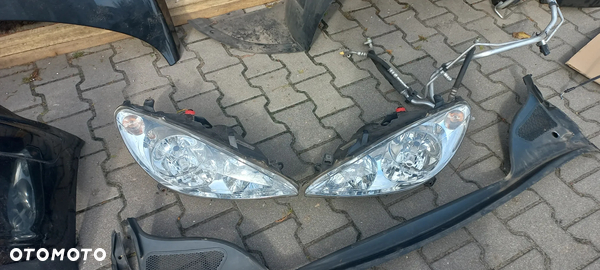 peugeot 307 cc lampa reflektor  lewy  europa igła