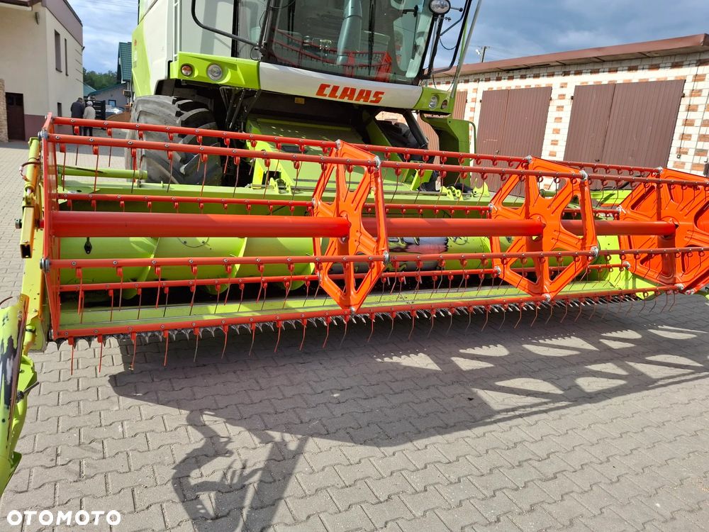 Claas tucano 420 - 2