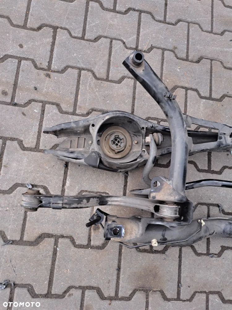 Volkswagen Golf VIII gti amortyzator aktywny tył 5WA512009AP kołyska tył sanki wózek czujnik poziomowania xejonów wahacz prawy tył Sprężyna - 5