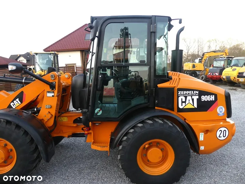 Caterpillar CAT 906H / Z Niemiec / 6424mtg / - 27