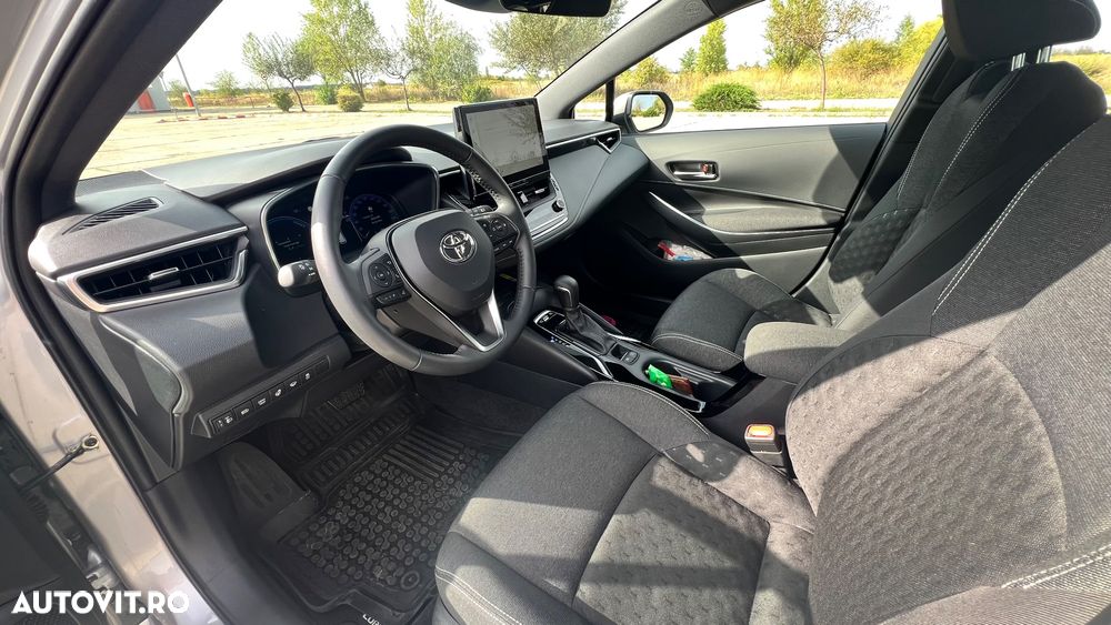 Toyota Corolla 1.8 HSD Business - 8