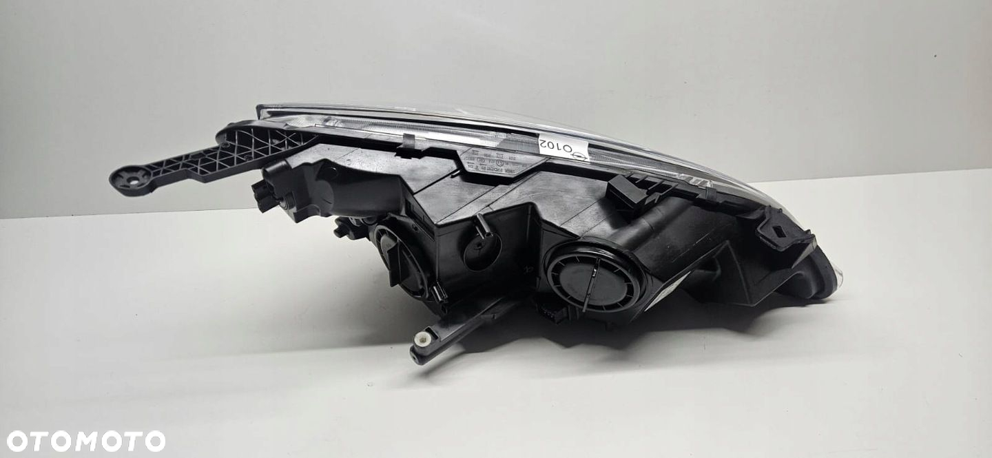 OPEL ASTRA IV 4 J GTC REFLEKTOR LEWY SOCZEWKA ZWYKŁA LAMPA - 12