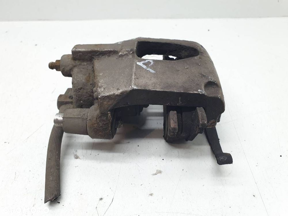 ZACISK HAMULEC PRZÓD PRAWY CARAVAN VOYAGER IV 3.3 V6 - 6