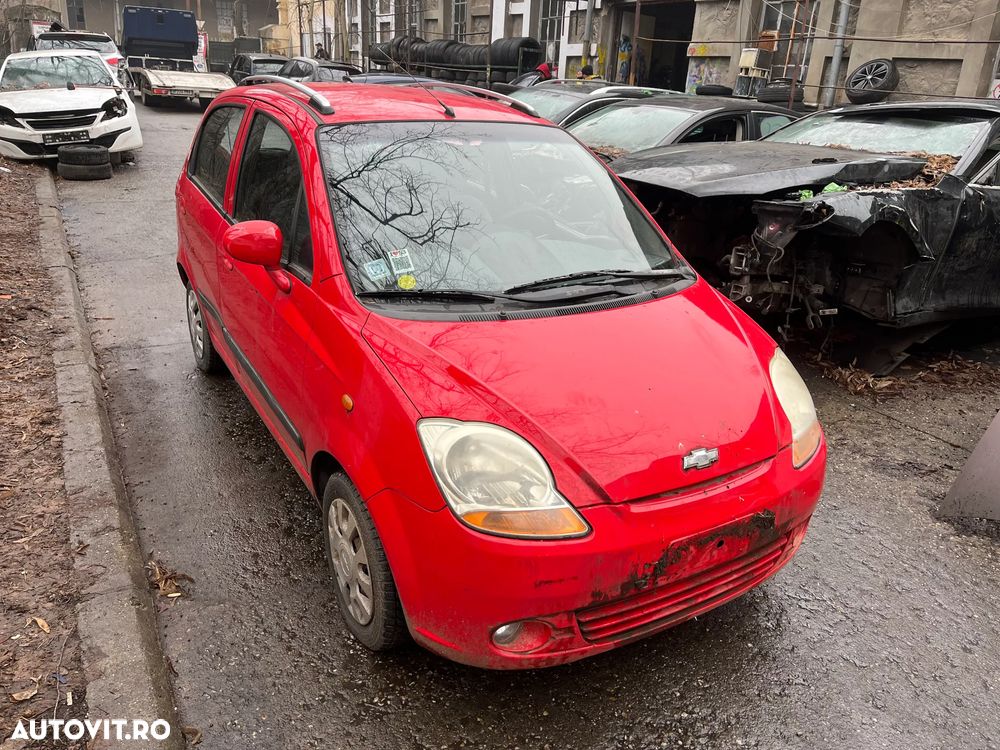 Dezmembrez Chevrolet Spark culoare rosu motor benzina 2008 - 10