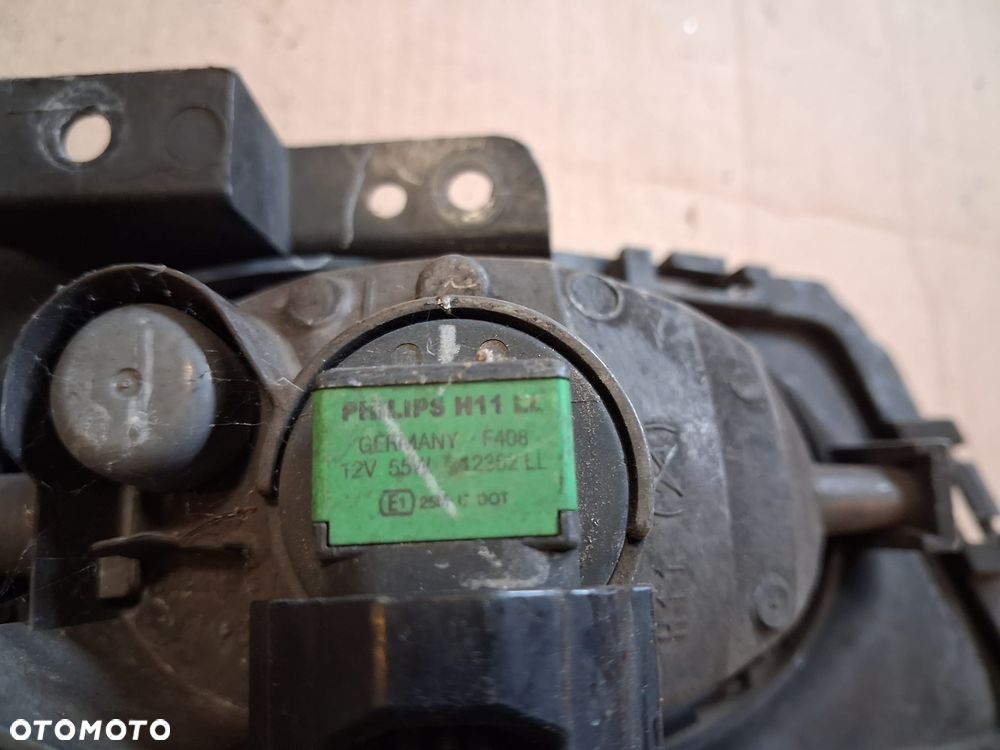 Halogen lewy MAZDA 3  I  OE - 2