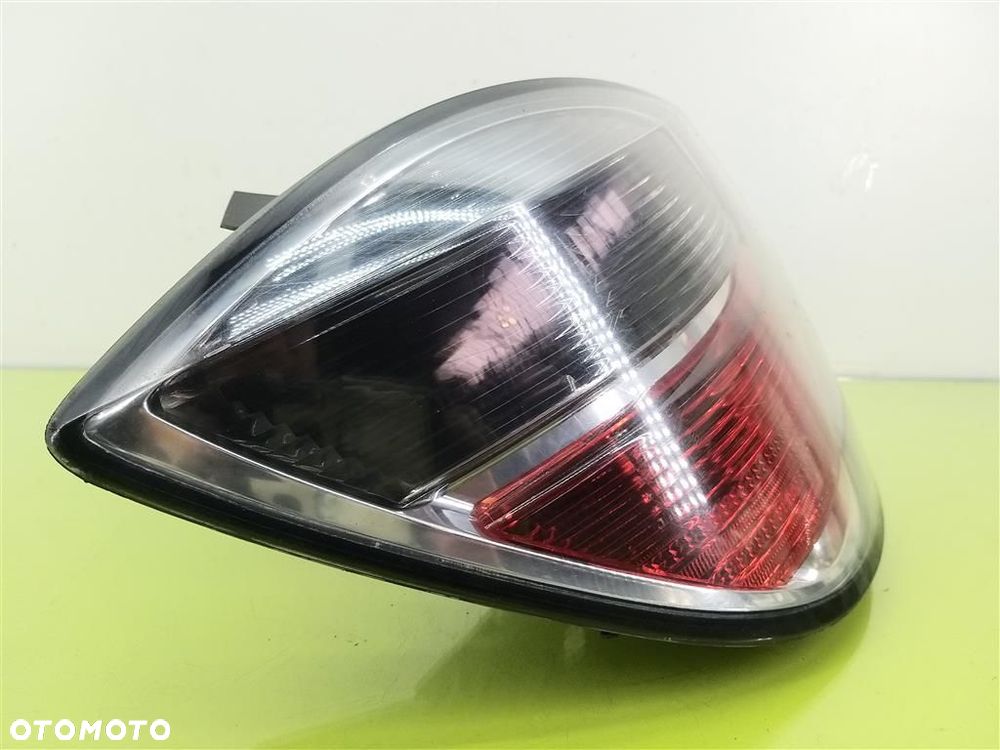 Lampa lewa tylna tył Opel Astra  III H 2004-2013R 5DRZWI VISTEON 13222324 - 2