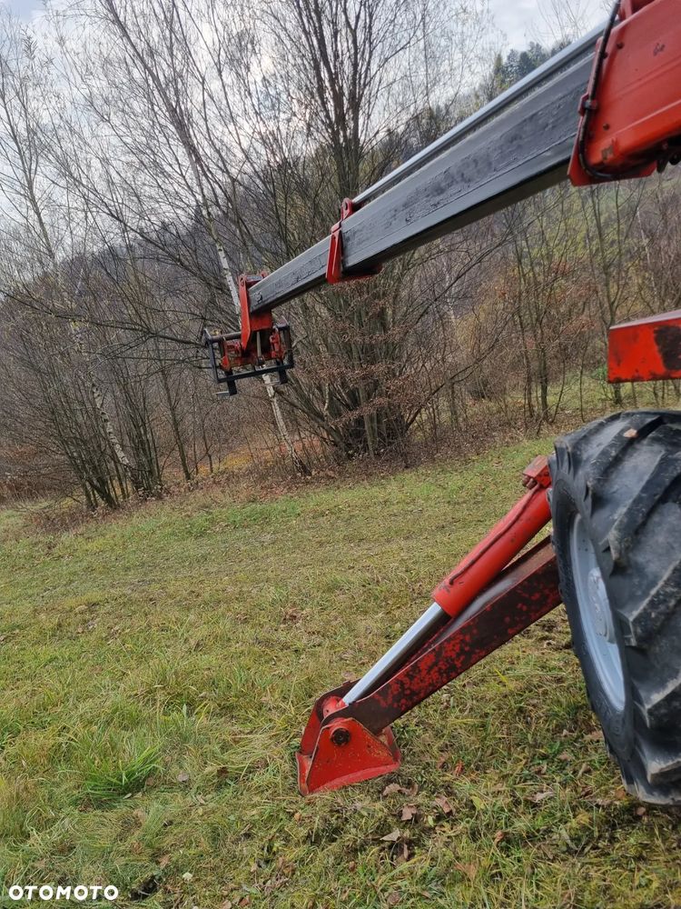 Manitou MT1230.SCP Ładowarka Teleskopowa z podporami 4x4. 13metrów Wysięg! Udzwig 3 tony. Silnik Perkins 4cyl. Import Norwegia! Perfekt stan! 3tryby skrętu. 4 biegi REWERS  Oryginał! Opony ładne. Potężna moc! - 32