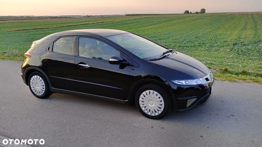Honda Civic 1.8 Comfort - 13
