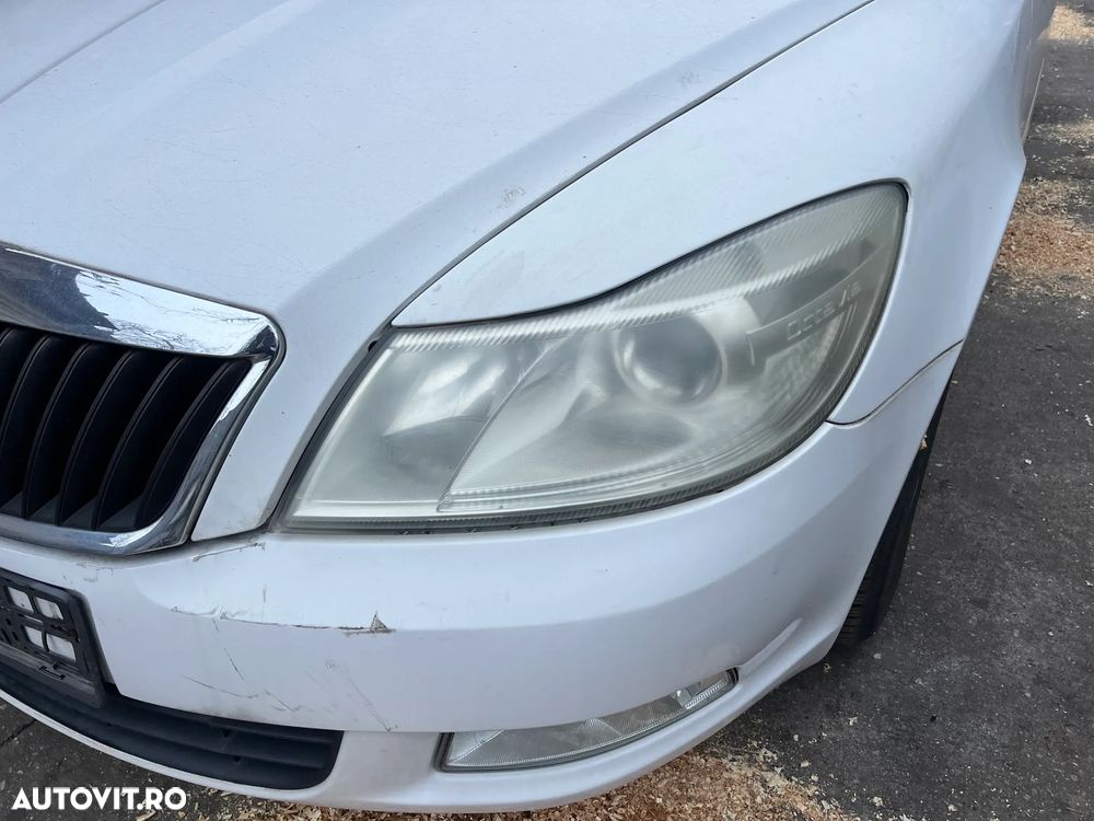 Far stanga cu lupa si halogen Skoda Octavia 2 facelift 2012 - 4