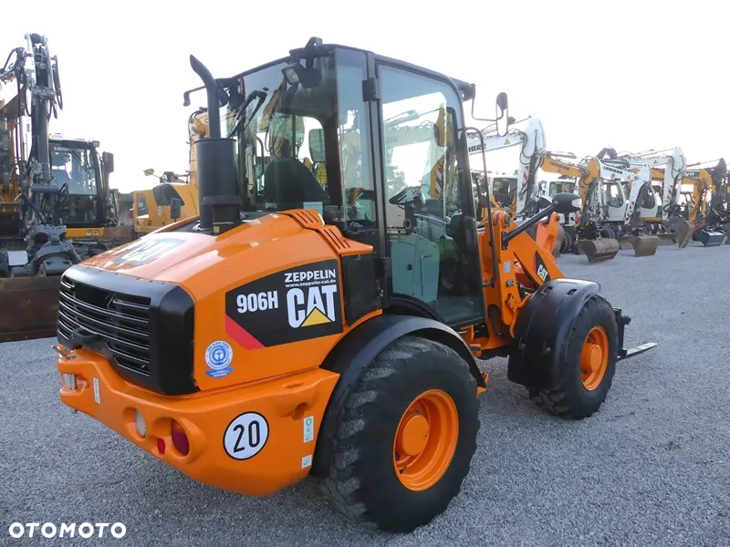 Caterpillar CAT 906H / Z Niemiec / 6424mtg / - 6