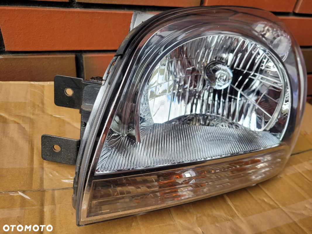 DEPO Reflektor lewy KIA SPORTAGE II 04- - 2