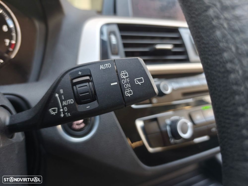 BMW 116 i Advantage — fotografia 24