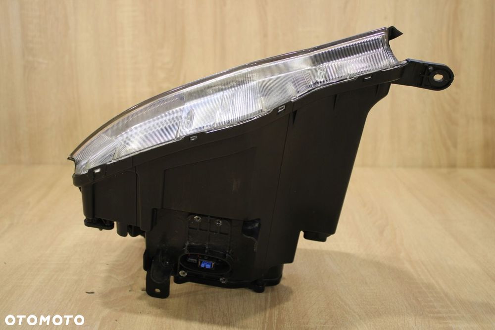 LAMPA PRAWY PRZÓD XENON OPEL ANTARA LIFT 2011- - 2