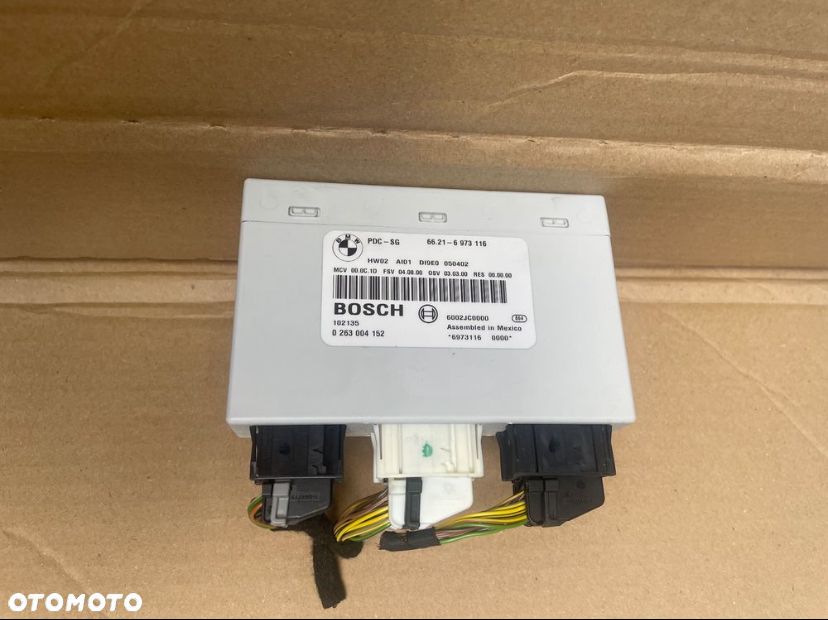 6973116 moduł sterownik parkowania pdc bmw 3 e90 e91 e81 e82 e87e84