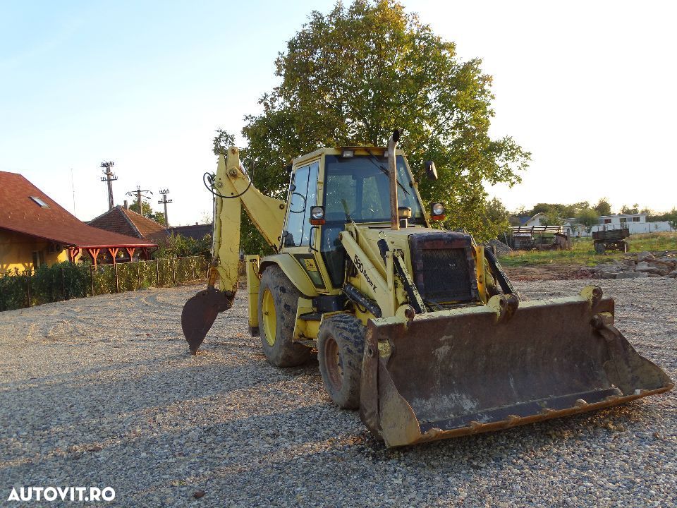 Buldoexcavator Case 580 SK,  din  95  piese - 1