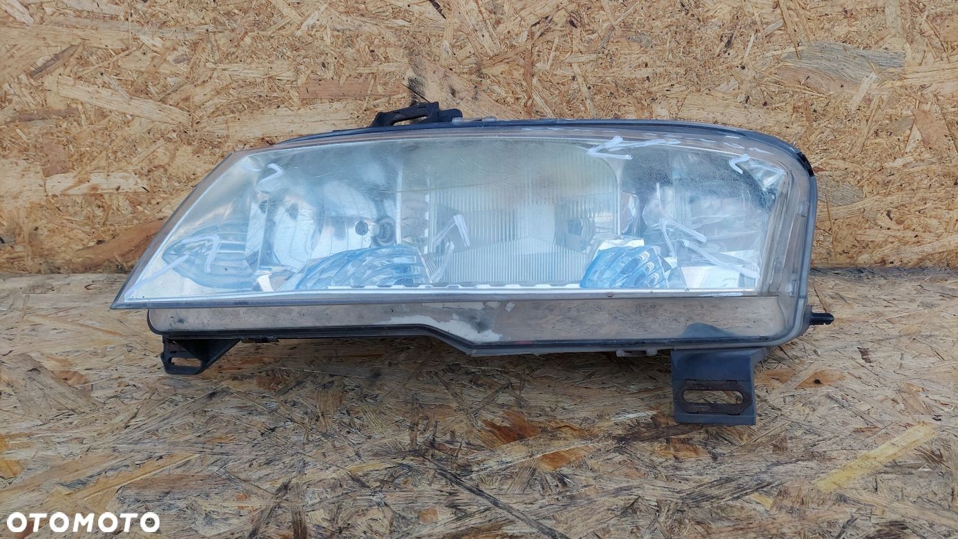LAMPA REFLEKTOR LEWY XENON LEWA FIAT STILO 3D - 1