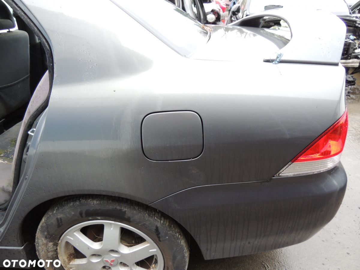 Ćwiartka nadwozia lewy tył Mitsubishi Lancer 7 '06 - 1