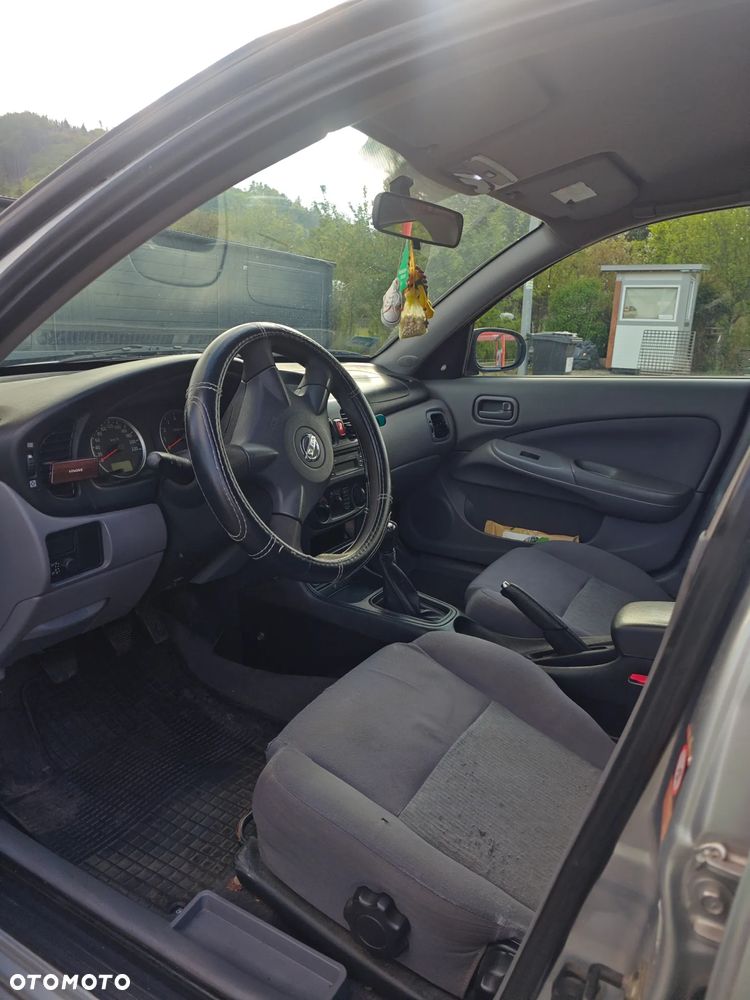 Nissan Almera 1.5 Visia + - 15