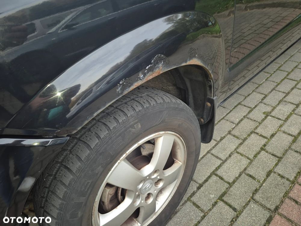 Hyundai Tucson 2.0 Elegance / Premium - 8